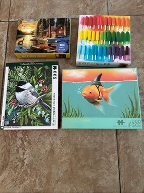 4 Colorful Jigsaw Puzzles in box. Rainbow Popsicles, Chickadee, and Lake Cabin.